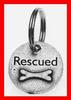 RESCUED tag or medal