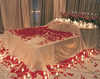 Bed of roses and candles