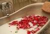 a milk bath with rose petals
