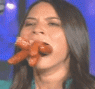 A mouth full of hotdogs