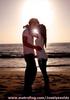 Sunset Kiss On The Beach