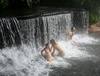 Bathing Under the Waterfalls